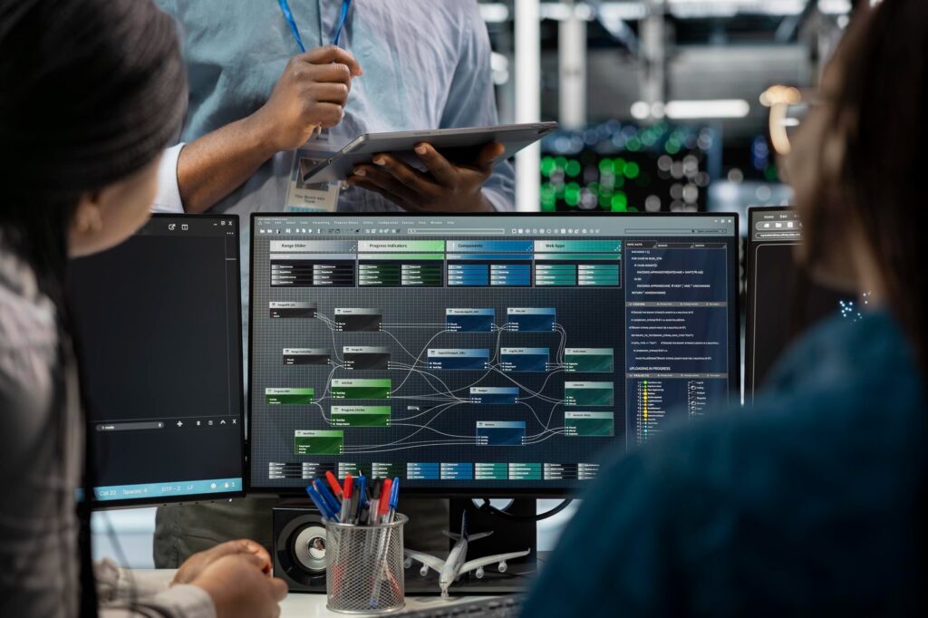 Close-up of computer screen displaying complex workflow, representing automation, orchestration, and IT processes