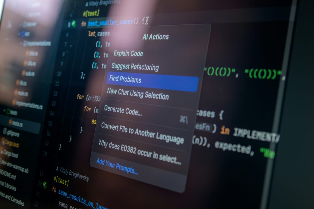 Computer screen displaying code with a dropdown menu highlighting “find problems” for debugging