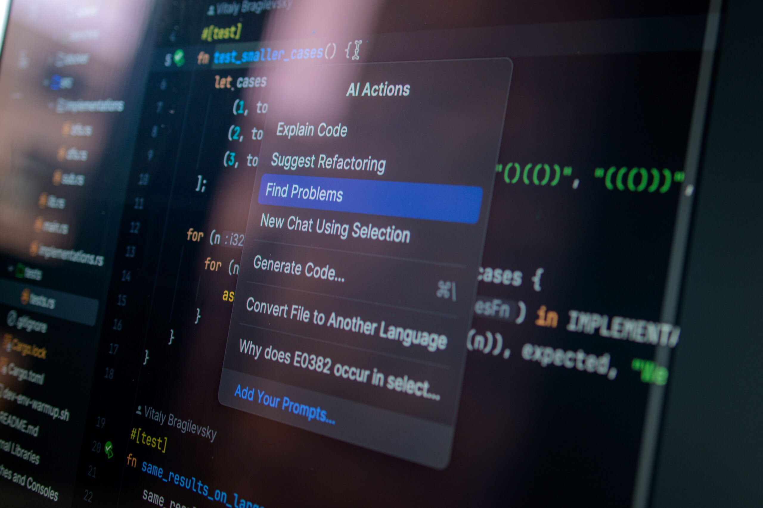 Computer screen displaying source code and a "Find Problems" menu, representing software development and IT troubleshooting.