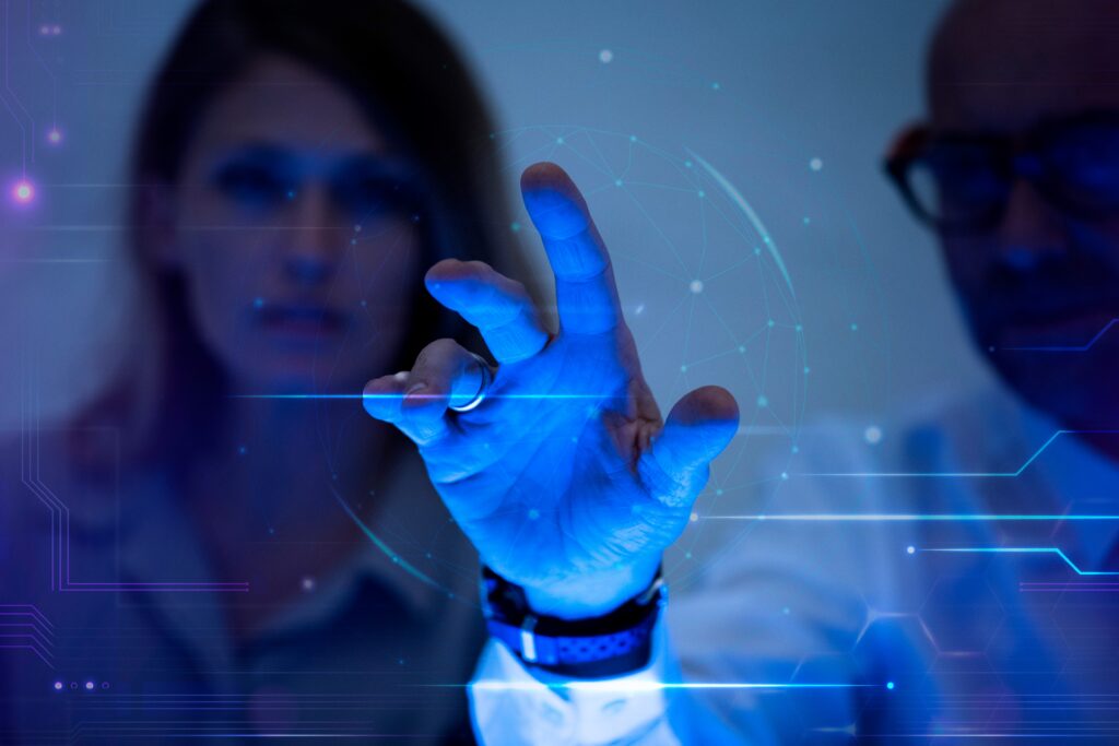 Two professionals working with technology, representing collaboration and digital innovation in enterprise IT